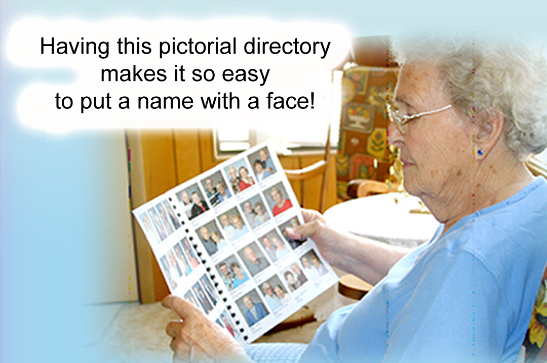 lady looking at photo directory book
